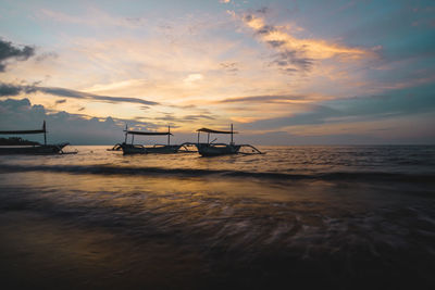 Traditional boat at sunset