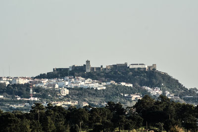 View of cityscape against clear sky