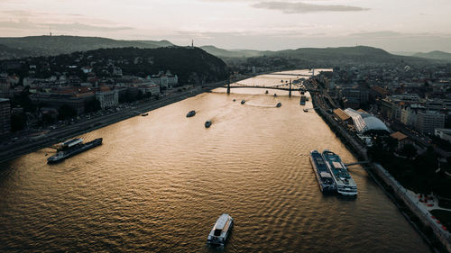 High angle view of river during sunset in city