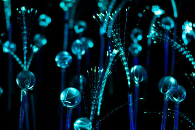 Blue fiber optic strands or filaments creating a magic fantastic abstract background