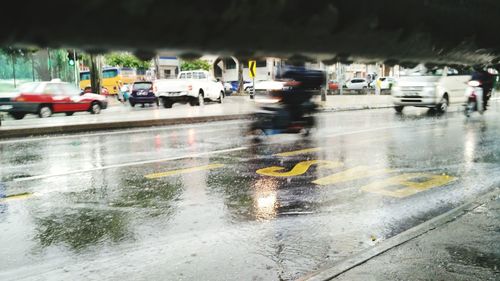 Blurred motion of cars on road
