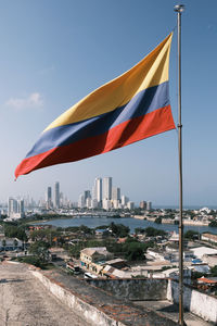 Low angle view of flag against sky