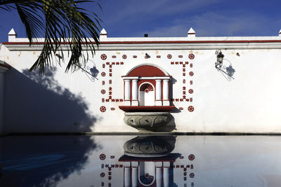 Low angle view of built structures in water