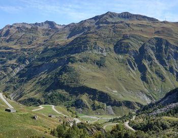 Scenic view of landscape and mountains against sky