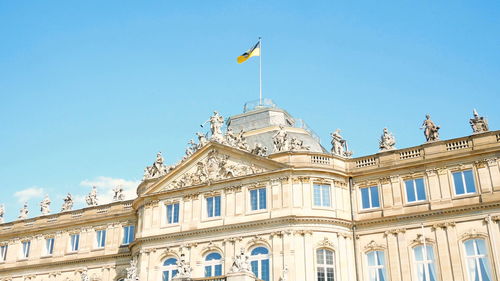 Low angle view of building against blue sky