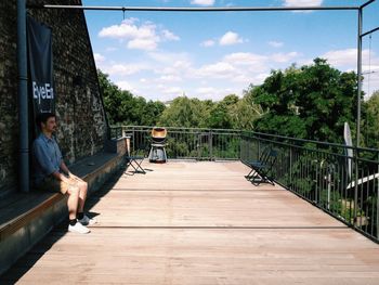 People walking on footbridge