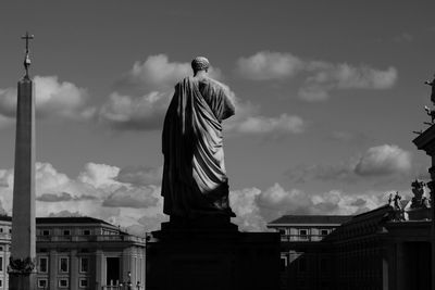 Low angle view of statue against sky in city