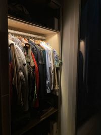 Panoramic shot of clothes hanging in rack