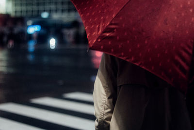 Low section of wet person in rainy season