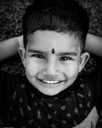 Close-up portrait of smiling boy