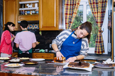 Group of people sitting on table