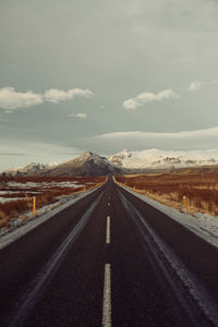 Road on landscape against sky