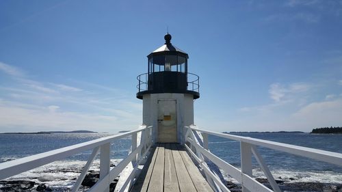 View of built structure by sea