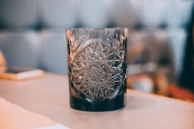 Close-up of glass on table