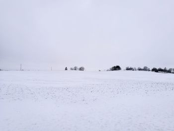 Scenic view of snow field against sky