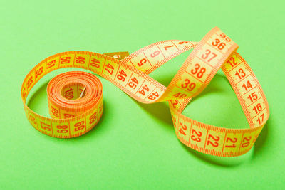 High angle view of yellow paper on table