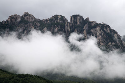 Scenic view of rocky mountains against sky