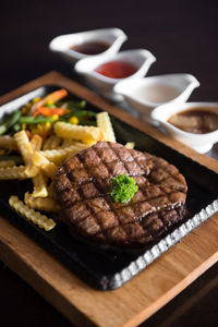 Close-up of food served on table