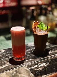 Close-up of drink in glasses on table