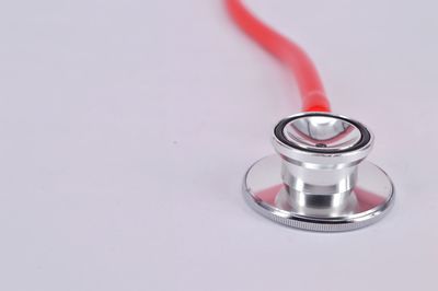 Close-up of stethoscope on white background