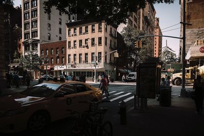 Group of people on road in city