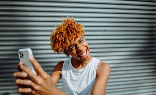 Young woman using mobile phone