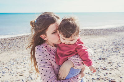 Mother and daughter at beach