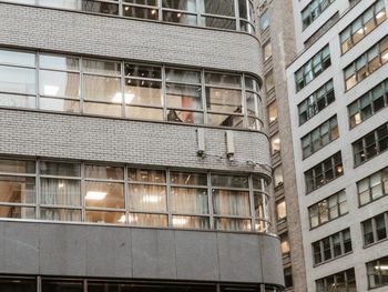 Low angle view of illuminated building in city