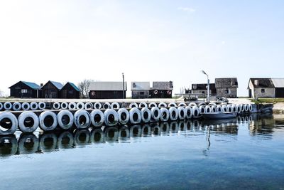 Row of built structures against clear sky