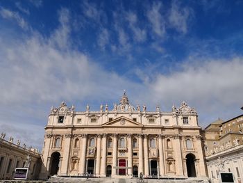 Low angle view of historical building against cloudy sky