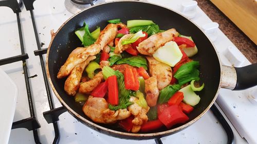 High angle view of meat in frying pan