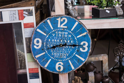 Close-up of clock on wall