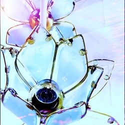 Low angle view of lamp post against blue sky