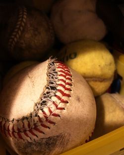 Close-up of damaged baseball