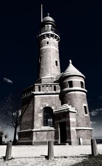 Low angle view of lighthouse against the sky