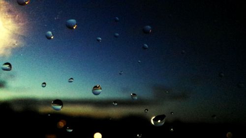 Close-up of water drops on glass