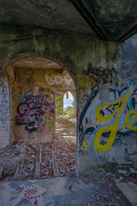 Graffiti on wall of abandoned building