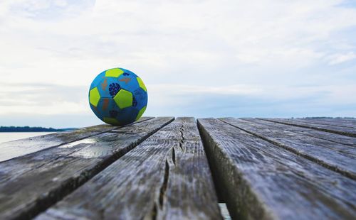 Close-up of ball on wooden table