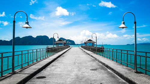 Pier over sea against sky