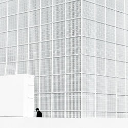 Shadow of man on modern building
