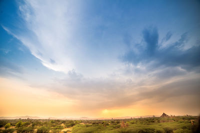 Scenic view of landscape against sky during sunset