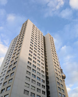 Low angle view of modern buildings against sky