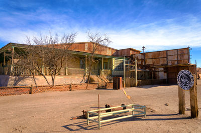 Abandoned building against clear sky