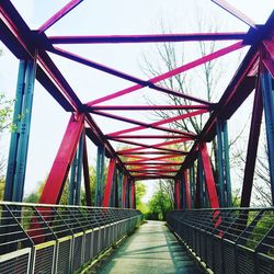 Footbridge against clear sky