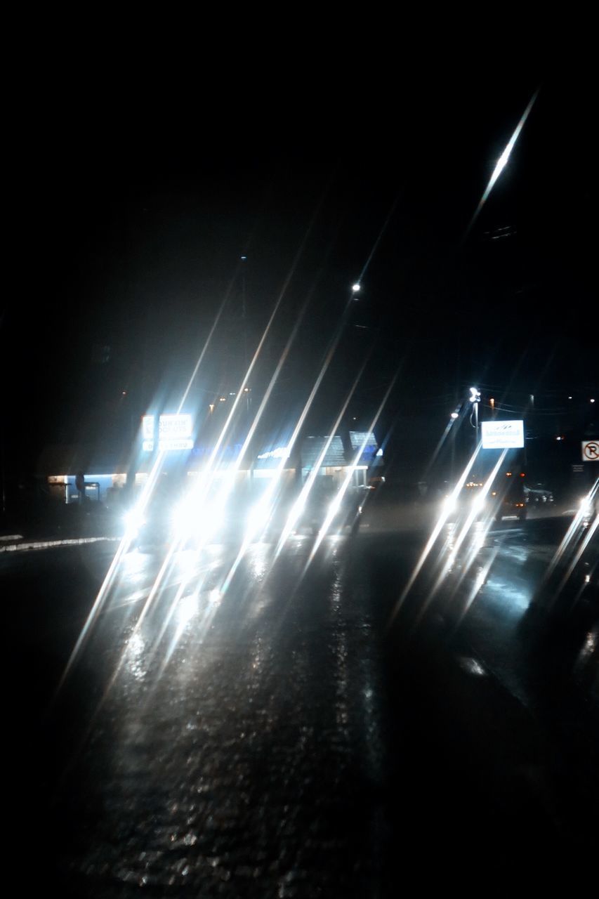 CARS ON ROAD AT NIGHT