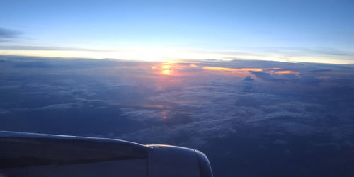 Aerial view of cloudscape against sky during sunset