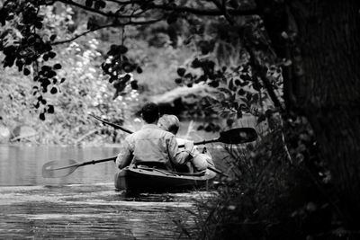 Man sitting in river