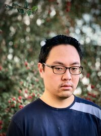 Portrait of young man wearing eyeglasses