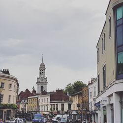 Buildings in city against sky