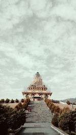 Temple against cloudy sky